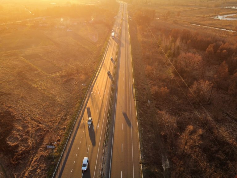 Aerial view over the highway at sunset